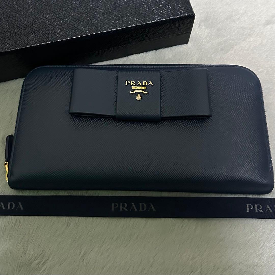 PRADA プラダ　長財布　リボン　ラウンドファスナー　ブルー　ゴールドロゴ