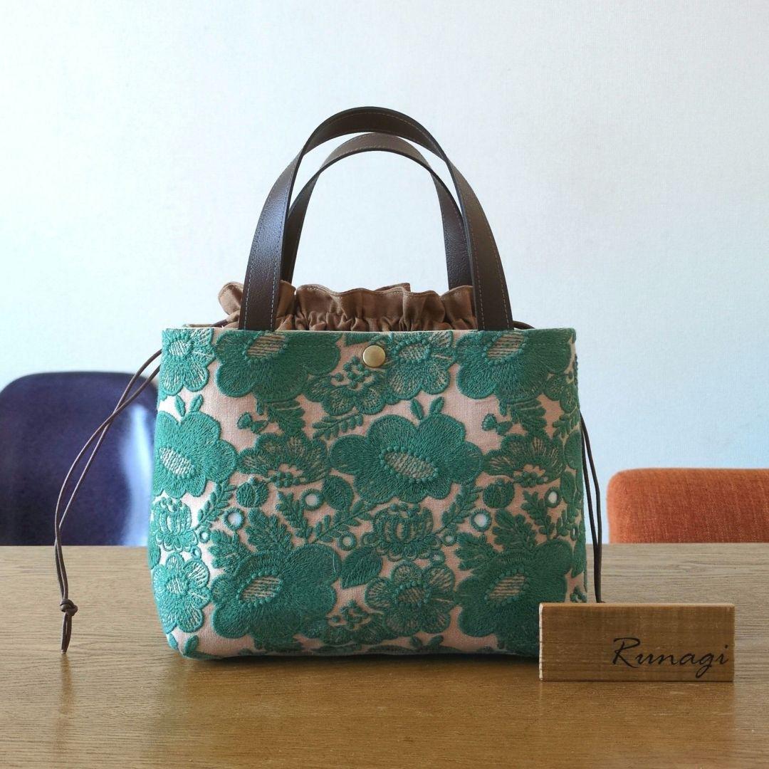 【1570】あおりポケットの巾着バッグ＊ミナペルホネン