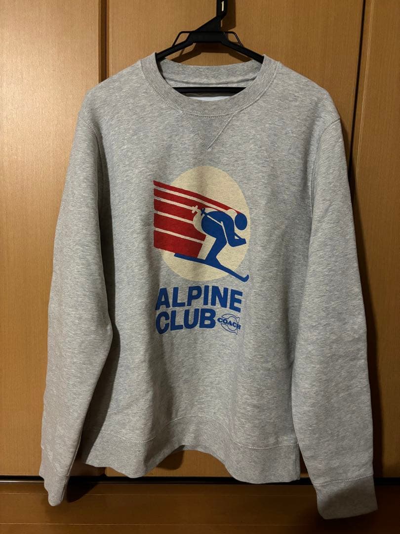 COACH アルペンクラブグラフィック　スウェットシャツ　オーガニックコットン