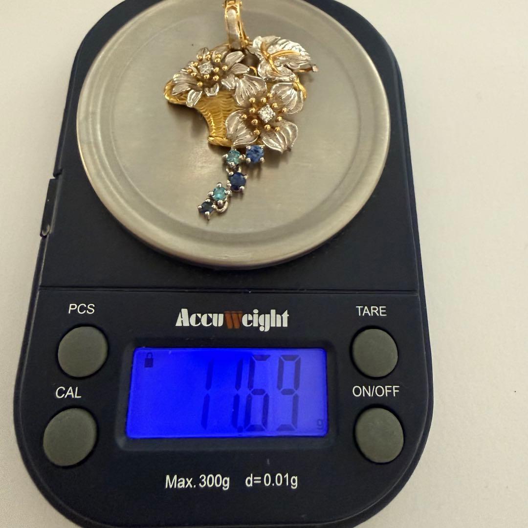 石川暢子ペンダントトップpt900K18ダイヤ0.24サファイヤ0.36ct