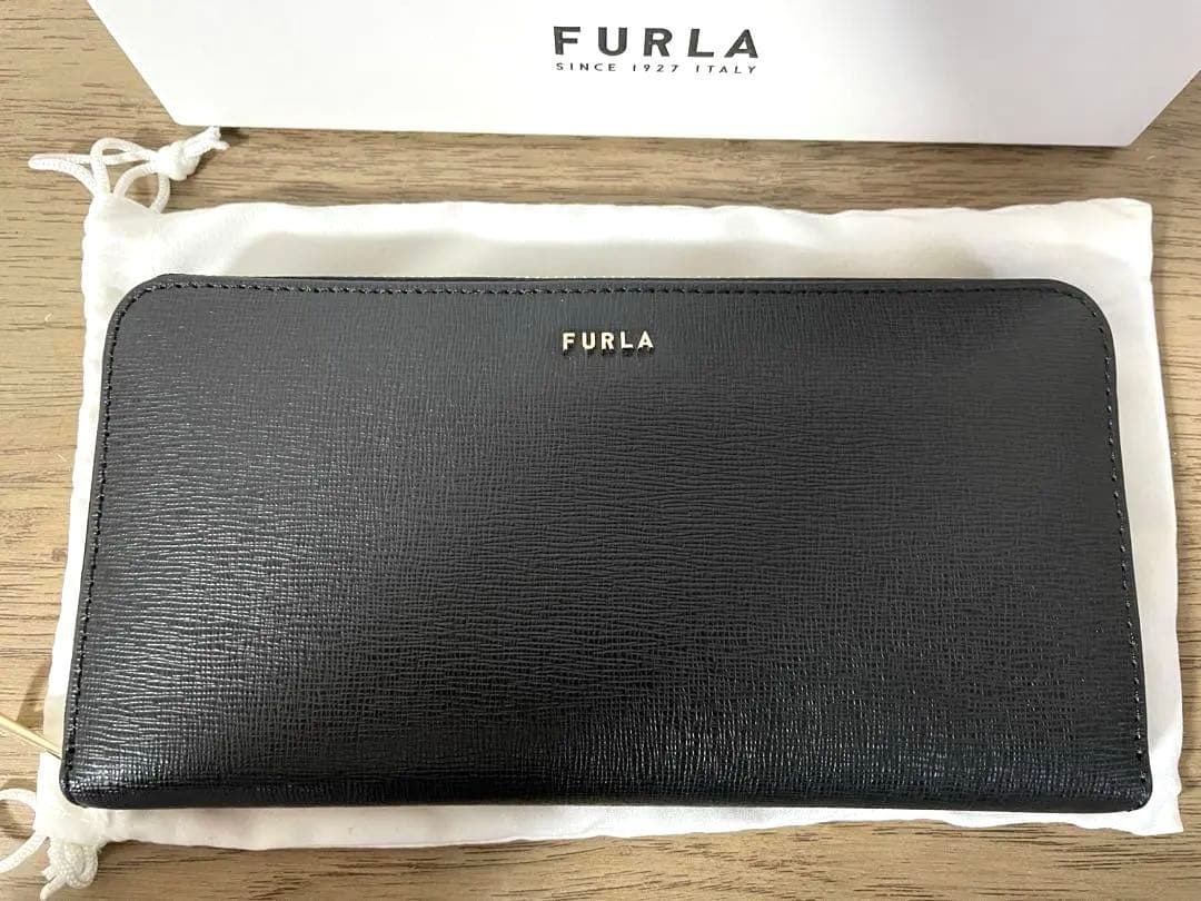 新品同様FURLA ブラックレザー長財布