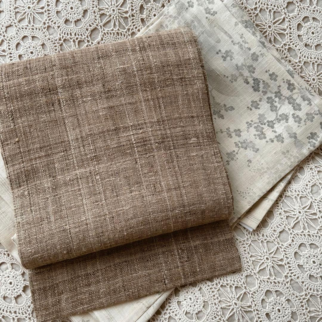 樹木の幹を思わせる焦げ茶色 無地帯 紬帯 信州紬 名古屋帯