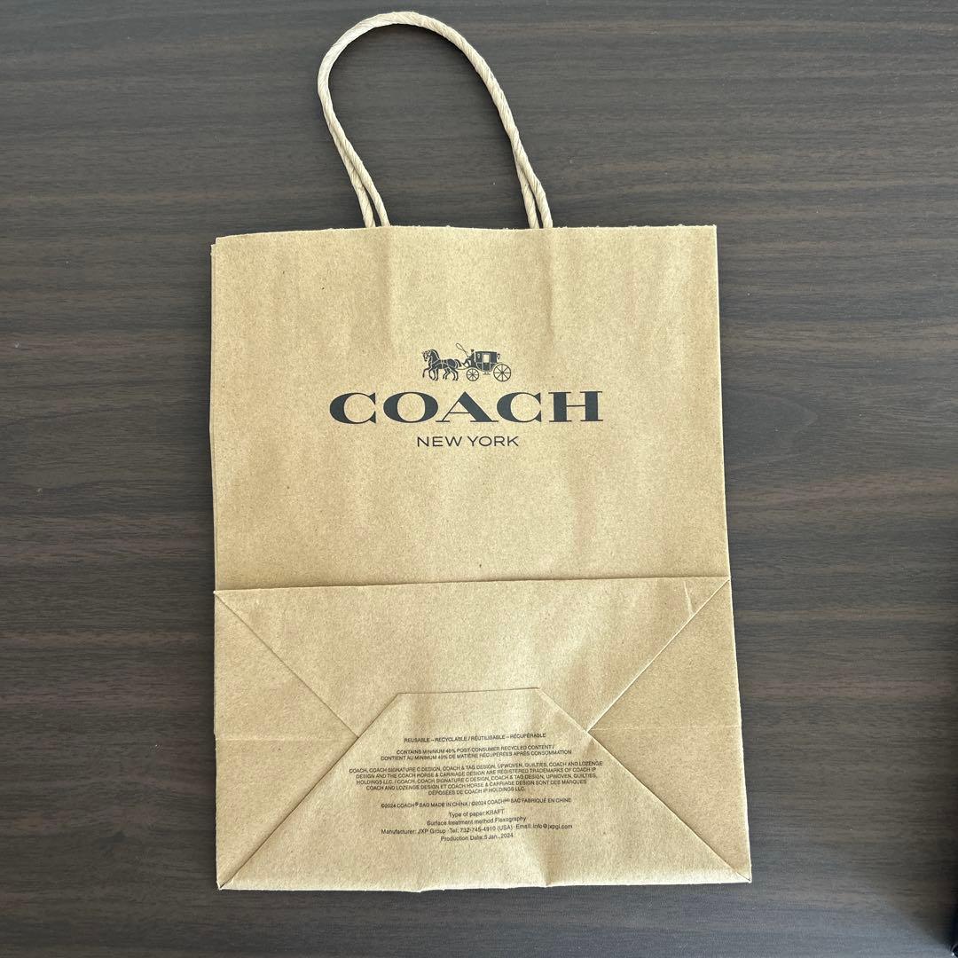 ①【新品】COACH レザー iPhone 15 ケース　手帳型スマホケース