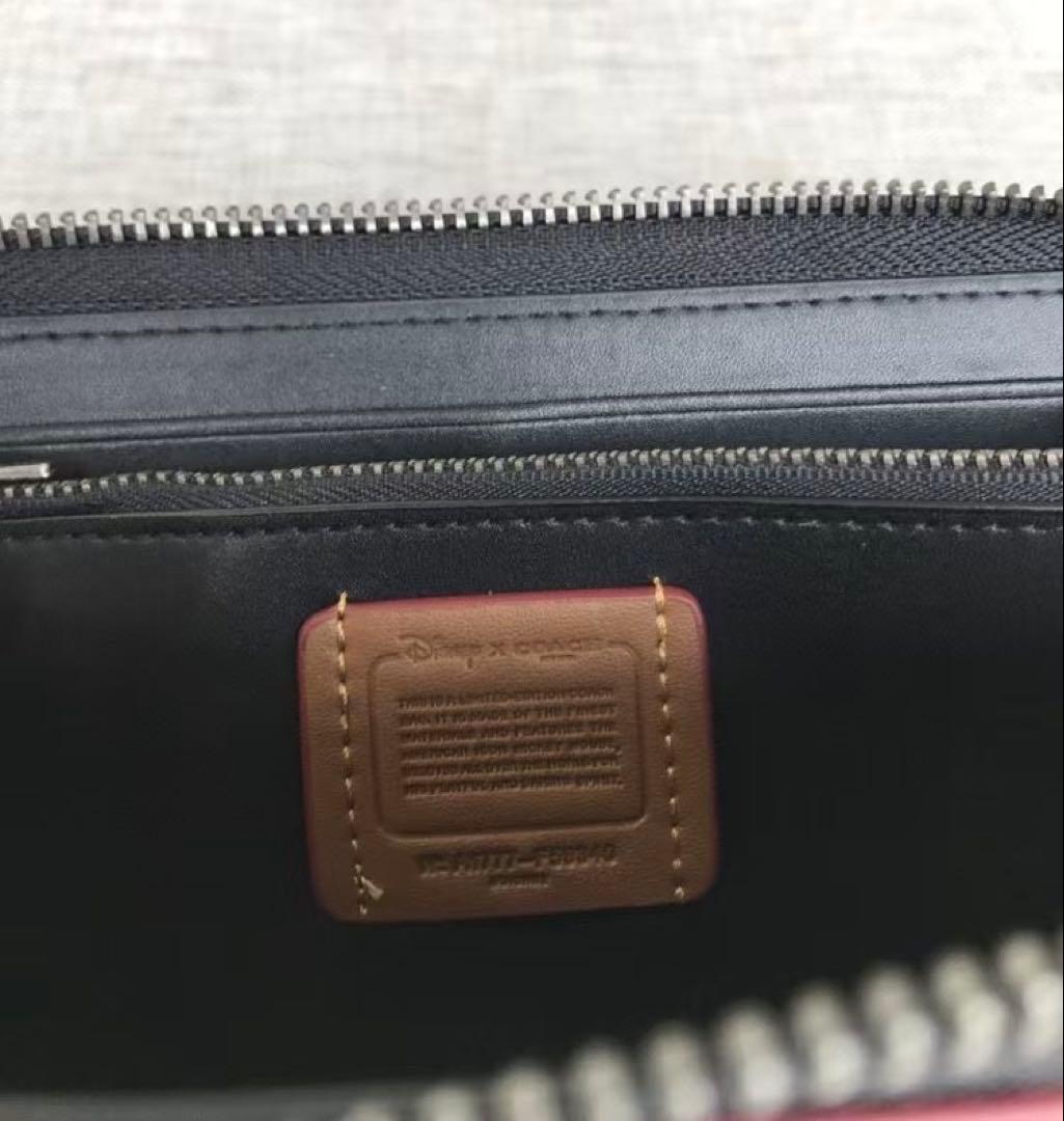 新品・未使用COACH スヌーピー 二つ折り財布コーチ　SNOOPY大人気