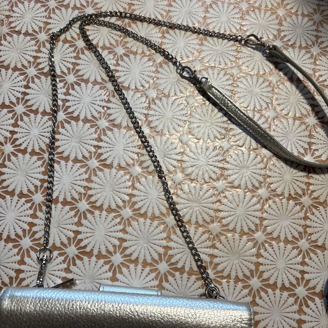 シルバー スマイルマーク クラッチバッグ