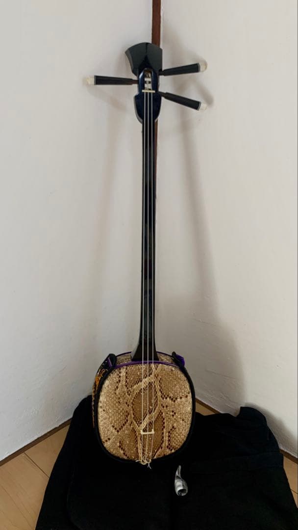 三線 沖縄 両面蛇皮 表側強化二重張り カラクイ1本弦2本新品交換