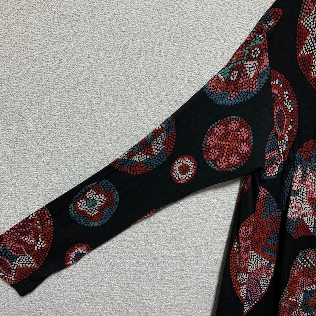 トクコプルミエヴォル セレブ 高級 上品 派手 個性的 人気 タートルネック