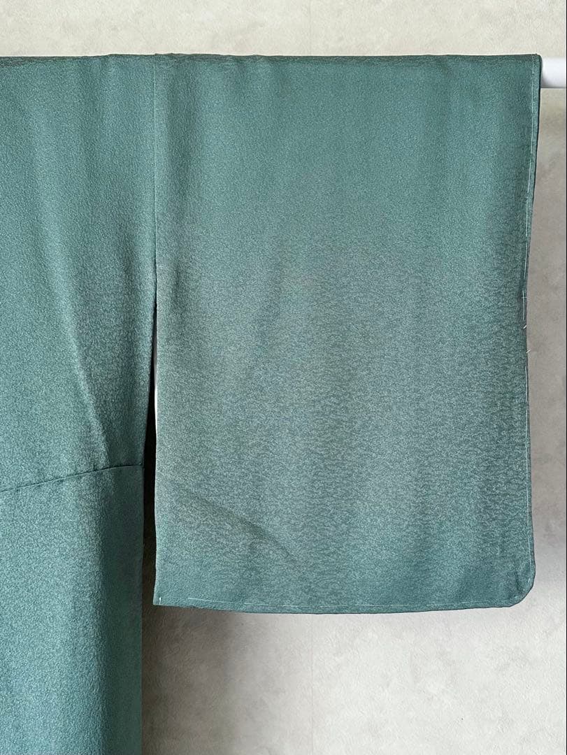 a09【在庫処分・特価】未使用 青緑 織柄 正絹 色無地 裄 64.5