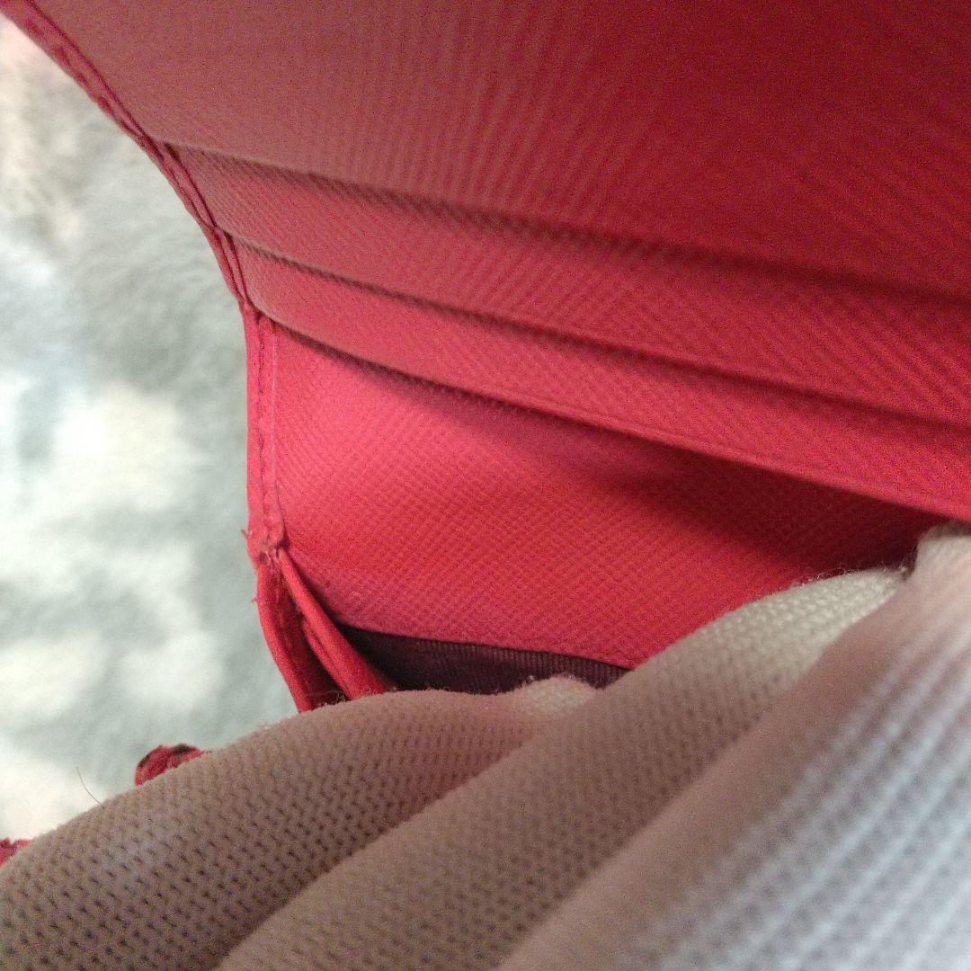 PRADAサフィアーノ リボン付き 長財布オレンジ系