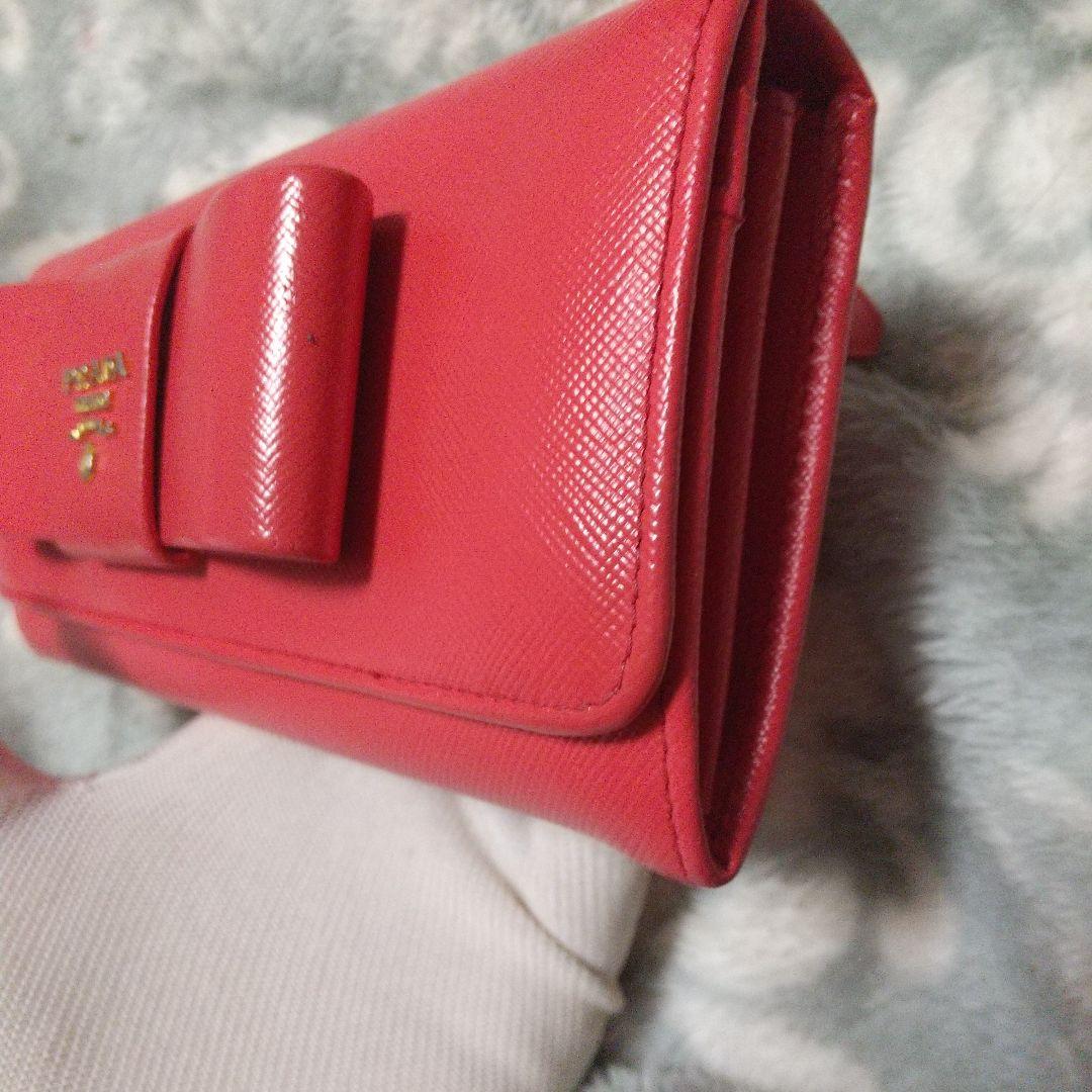 PRADAサフィアーノ リボン付き 長財布オレンジ系