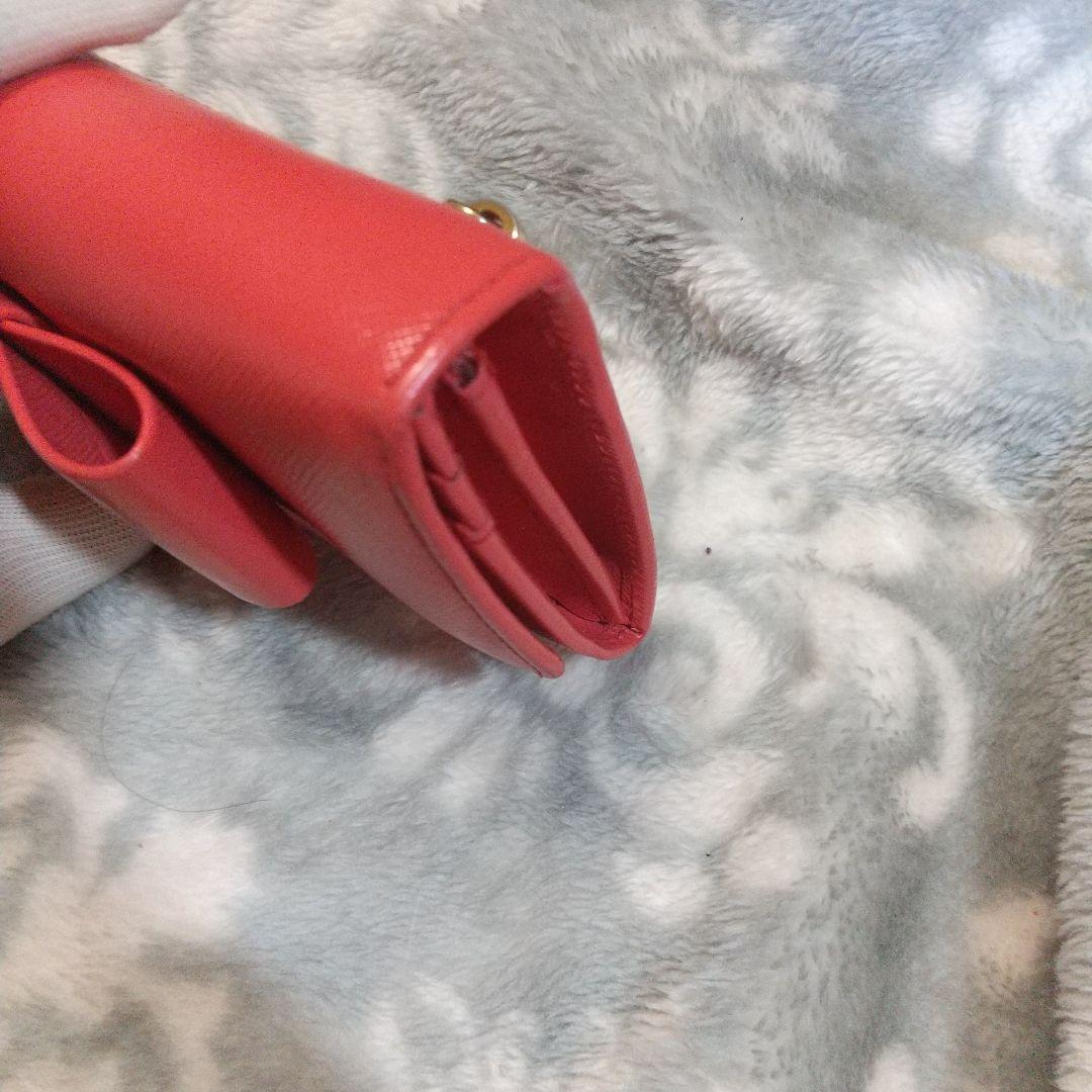 PRADAサフィアーノ リボン付き 長財布オレンジ系