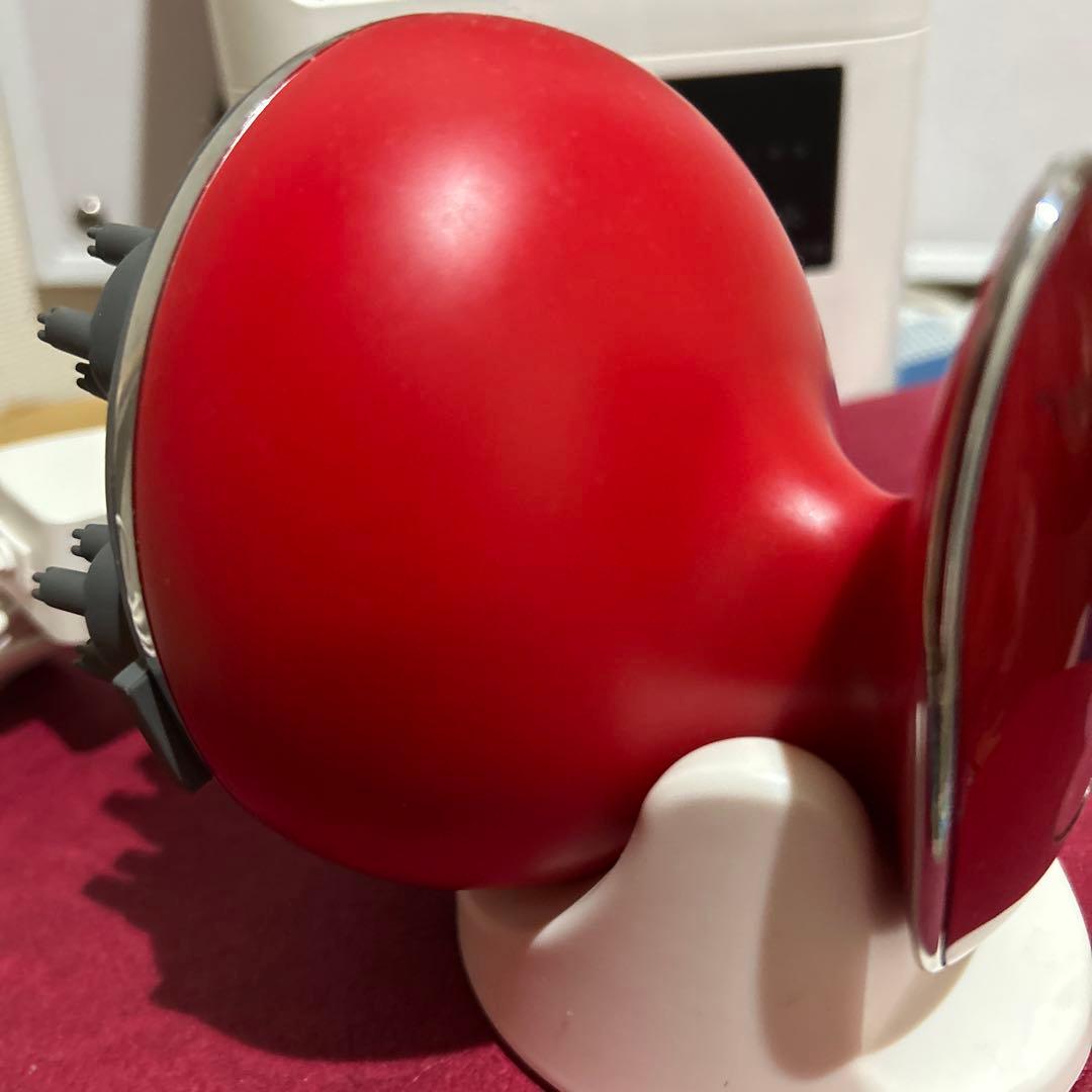 赤い卵型マッサージ器
