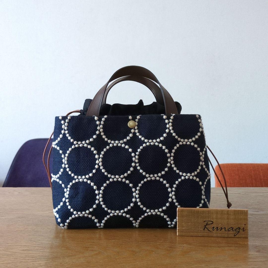 【1549】あおりポケットの巾着バッグ＊ミナペルホネン