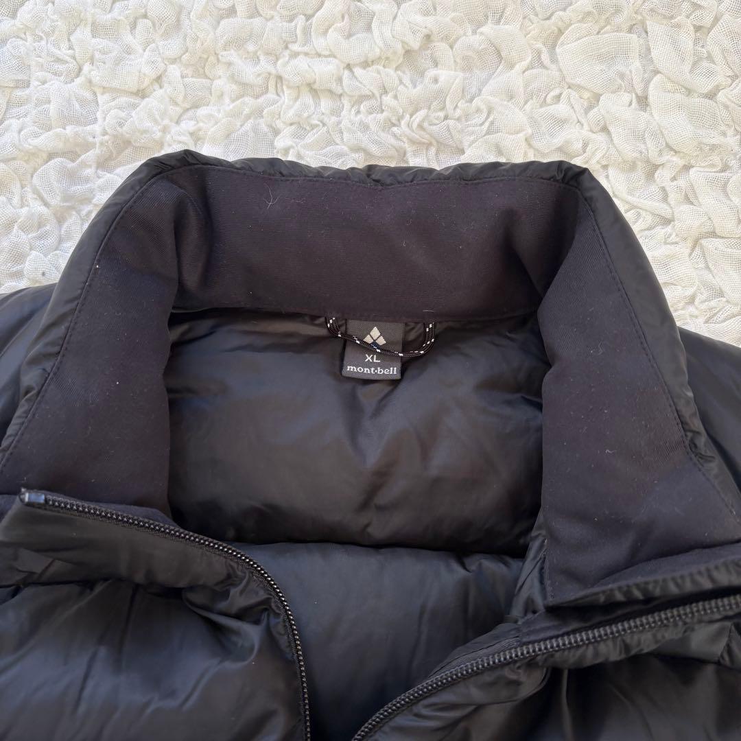 美品モンベル ライトアルパインダウンベスト(XL)ブラック系色