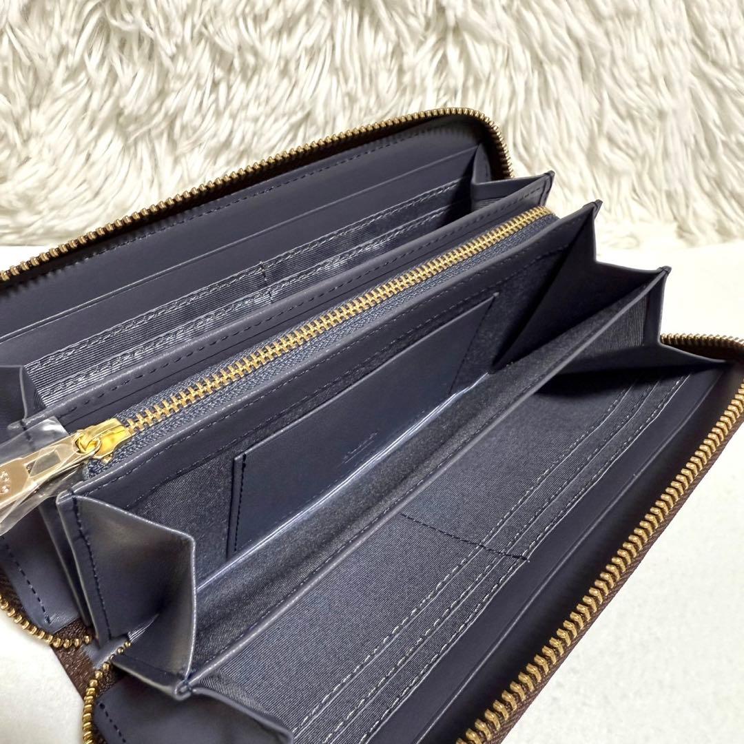 未使用 ラシット モノグラム プレート ラウンドジップ ウォレット 長財布