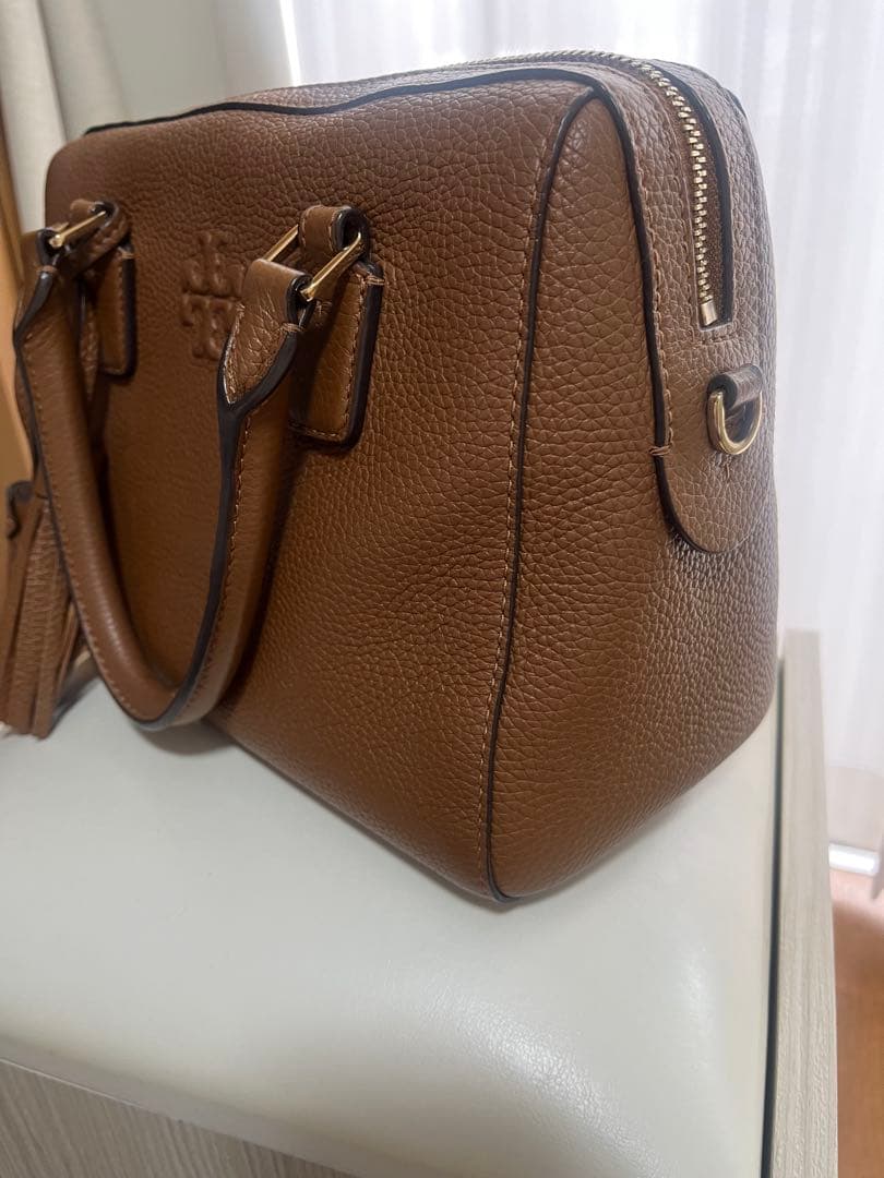 な*ぺ様 ブラウンレザー ハンドバッグ タッセル付き