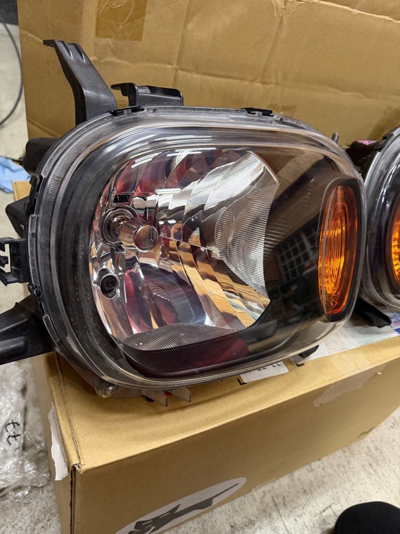 アルトラパンhe22s ヘッドライト(インナーブラック)