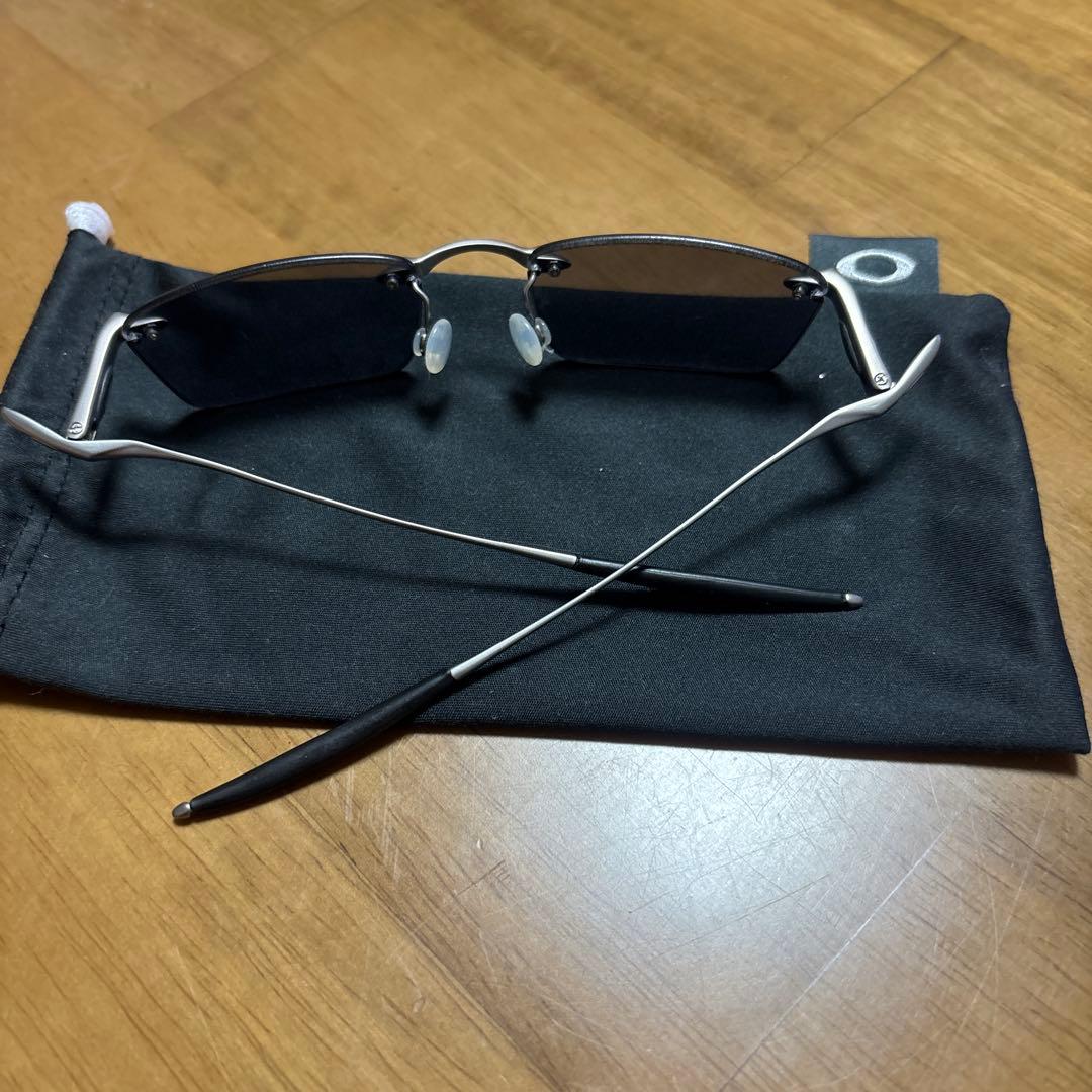 Oakley スポーツサングラス 偏光レンズ