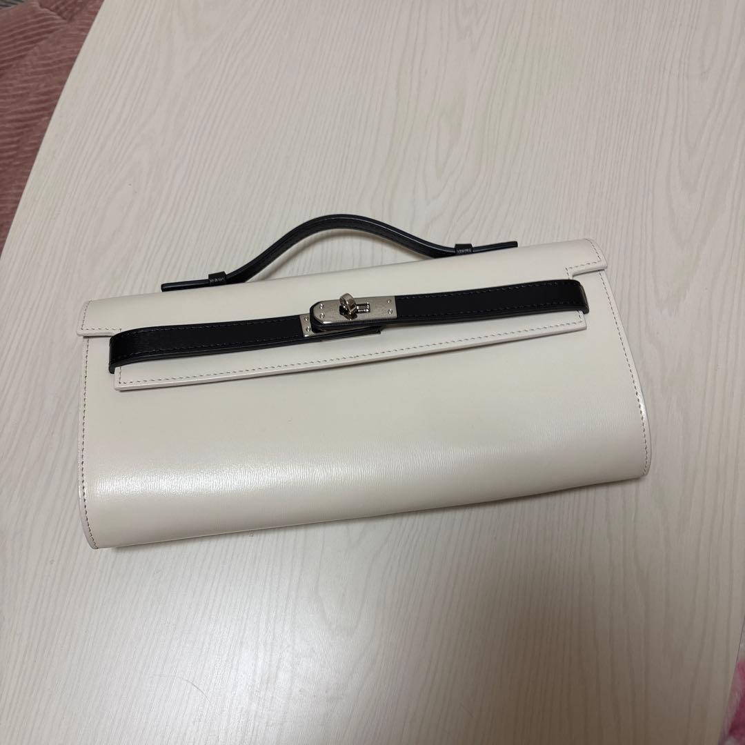 Whim Gazette バイカラークラッチバッグ